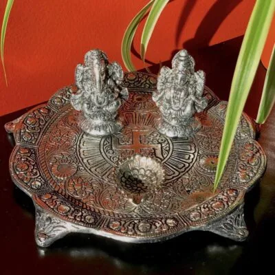 Lakshmi Ganesh idol with Diya on a 8" round plate stand.