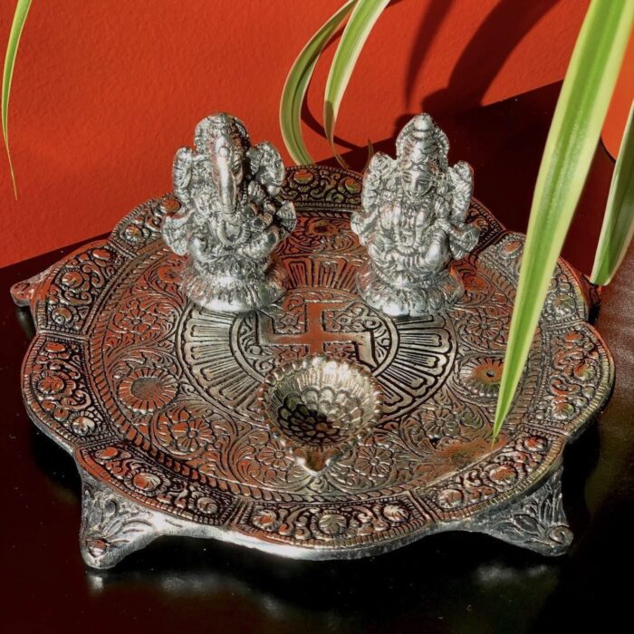 Lakshmi Ganesh idol with Diya on a 8" round plate stand.