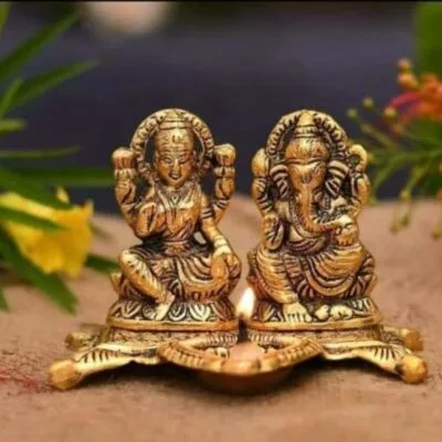 Lakshmi Ganesha idol with Diya